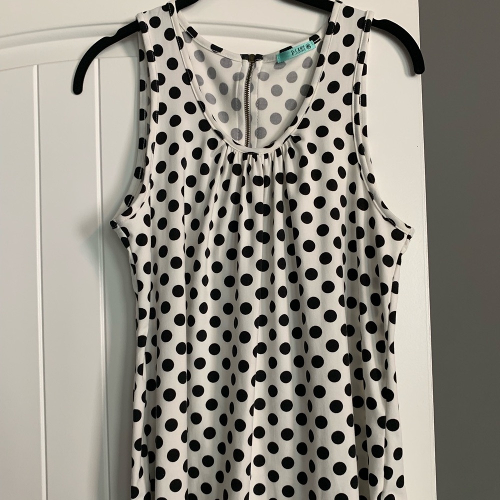 Sleeveless polka dot top with zipper detail